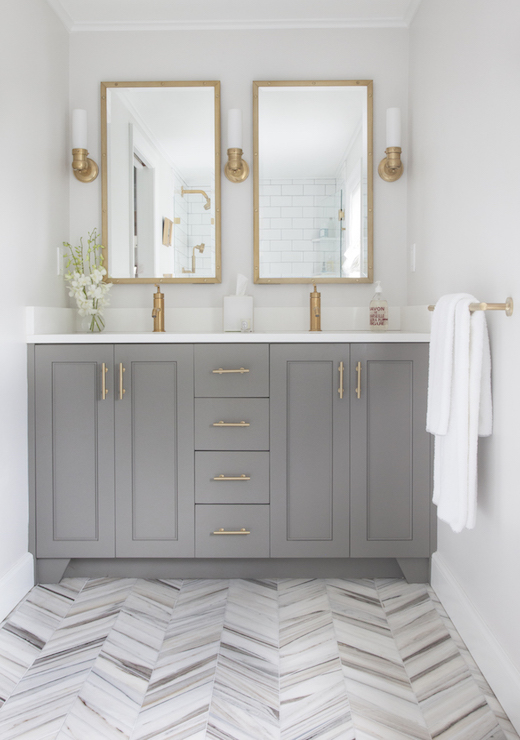 Love this modern gray vanity bathroom remodel with the gold rectangle mirrors, so pretty!