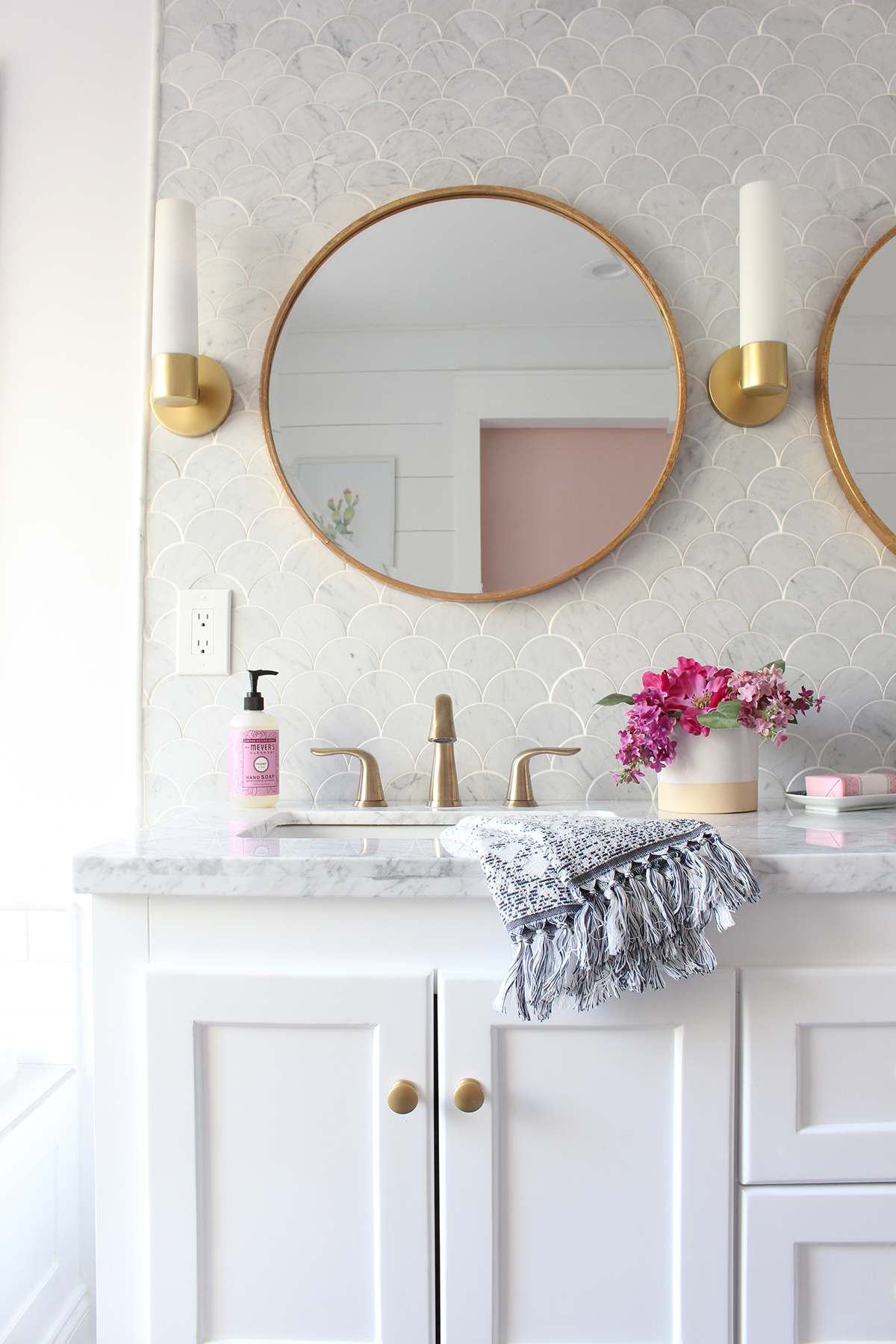 Adore this master bathroom remodel with gray fan tile and dark gray grout. Such a pretty bathroom renovation!