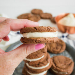 Homemade Oreo Cookies Are Much More Filling Than The Store Bought Kind. You'll Love How Chewy The Cookies Are, Especially When They're Stuffed With A Sweet Cream Cheese Frosting. Serve With A Cold Glass Of Milk And Don't Forget To Dunk! #homemadeoreos #oreocookies #cookierecipe #oreos #dessertidea #yum