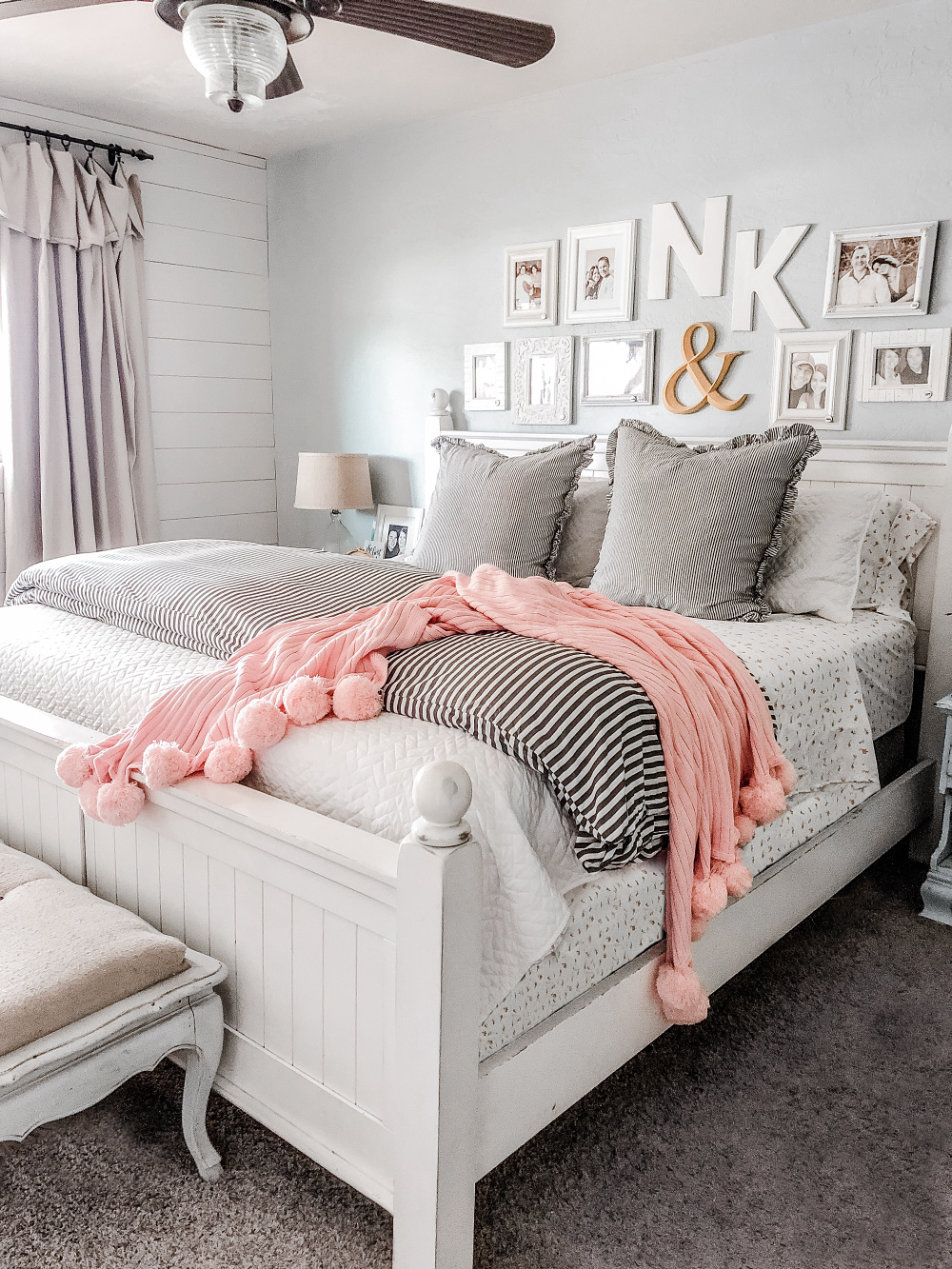 How to layer bedding using a coverlet and duvet. Love these cozy farmhouse bedding ideas. Create a master bedroom you can't wait to come home to! #masterbedding #farmhousebedding #seersuckerbedding #duvet #coverlet #howtostylebedding #homedecor