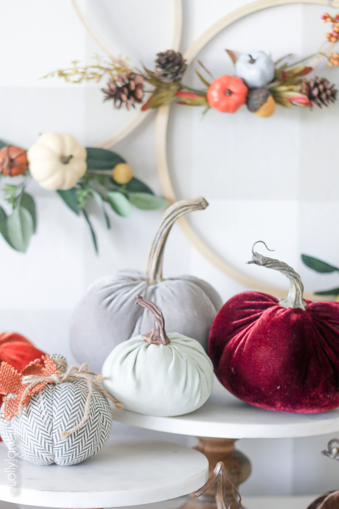 Love this cluster of pumpkins to make it feel cozy like fall. Pair with this easy DIY Pumpkin Hoop Wreath and you're set for the season! #fallwreaths #diyfallwreaths #fallwreathideas #falldoorwreaths #diy #falldecor #homedecor #fallhomedecor