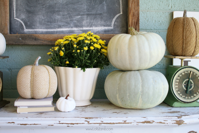 Decorating with pumpkins to create pretty porch decor is so fun! Layer neutral pumpkins by stacking them to create cute fall porch decor affordably. #falldecor #fallporch #fallporchdecor #falldecoratingideas