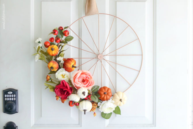 Super easy DIY Fall Wreath... love the bicycle rim look! 