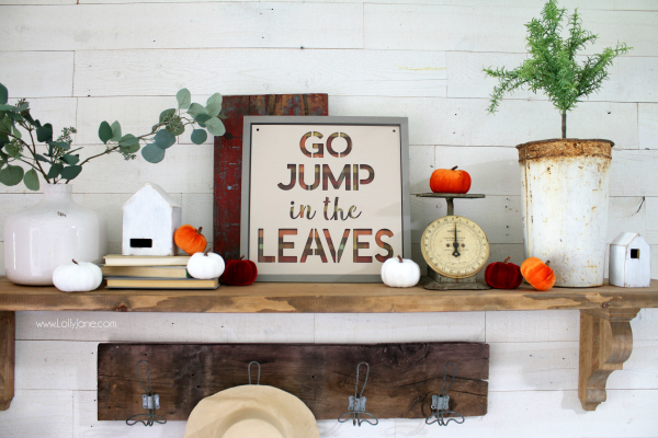 Love these fall mantel decorating ideas with this easy to make fall sign! Learn to make this plaid go jump in the leaves sign with a little painting! #falldecor #fallmantel #falldecorating #fallsign #diyfallsign #falldecorideas #fallmantelideas