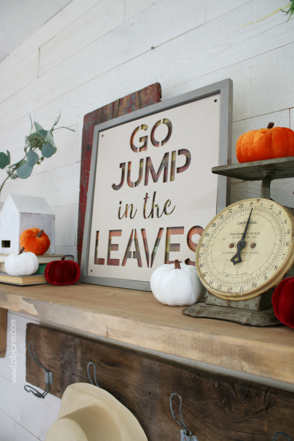 How to decorate a fall mantel. How to layer pumpkins and group fall colored items together to create a simple fall mantel! #howto #falldecor #howtodecorateforfall #fallmantel #fallmanteldecor #fallmanteldecorations #fall #fallideas