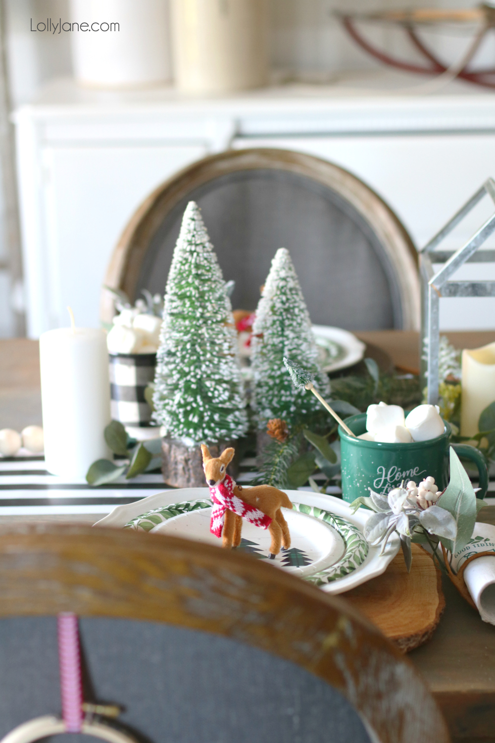 Bottle brush trees are ALL the rage right now and are so versatile when it comes to decorating for the holidays! See how we used them for the cutest ever Christmas tablescape! #christmas #christmastablescape #christmascenterpiece #centerpiece #wintertablescape #diy