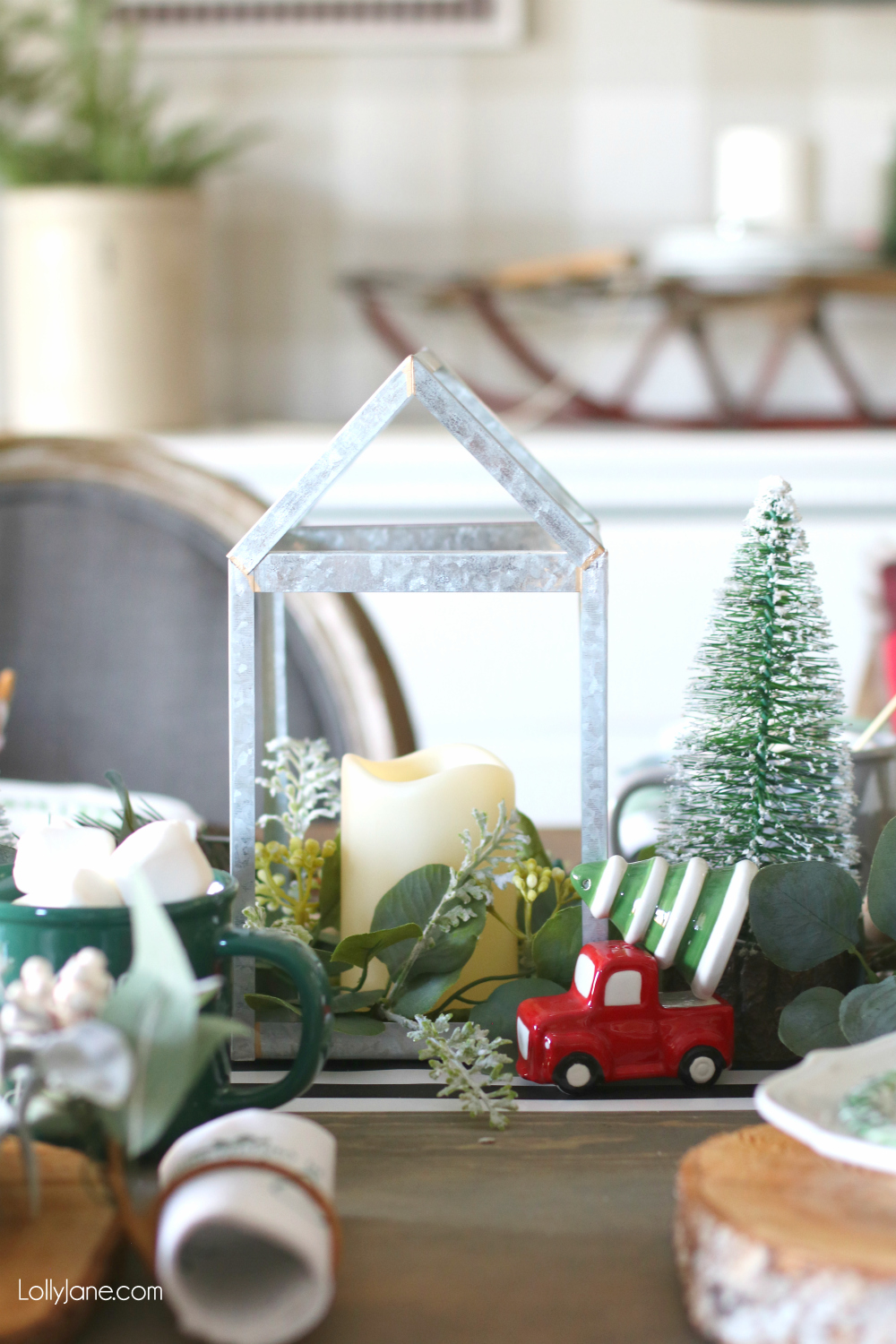 Cutest vintage truck + tree Salt+Pepper shakers! Love this whole setup ready for Christmas dinner! #christmas #christmastablescape #christmascenterpiece #centerpiece #wintertablescape #diy