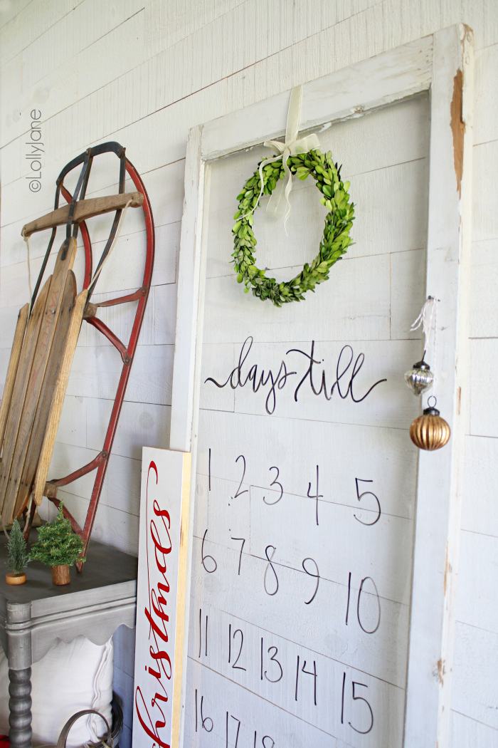 Look how easy it is to make a Christmas countdown! We used an old window to create a dry erase Christmas countdown using dry erase markers. Hang a boxwood wreath for instant easy Christmas decor! #diy #diyChristmas #christmasdecor #christmascountdown #dryerase