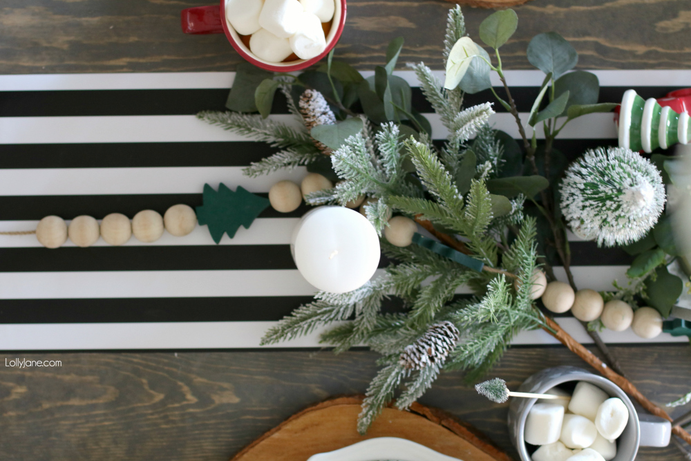 Love this Christmas tablescape with easy ideas how to create your own! #christmas #christmastablescape #christmascenterpiece #centerpiece #wintertablescape #diy