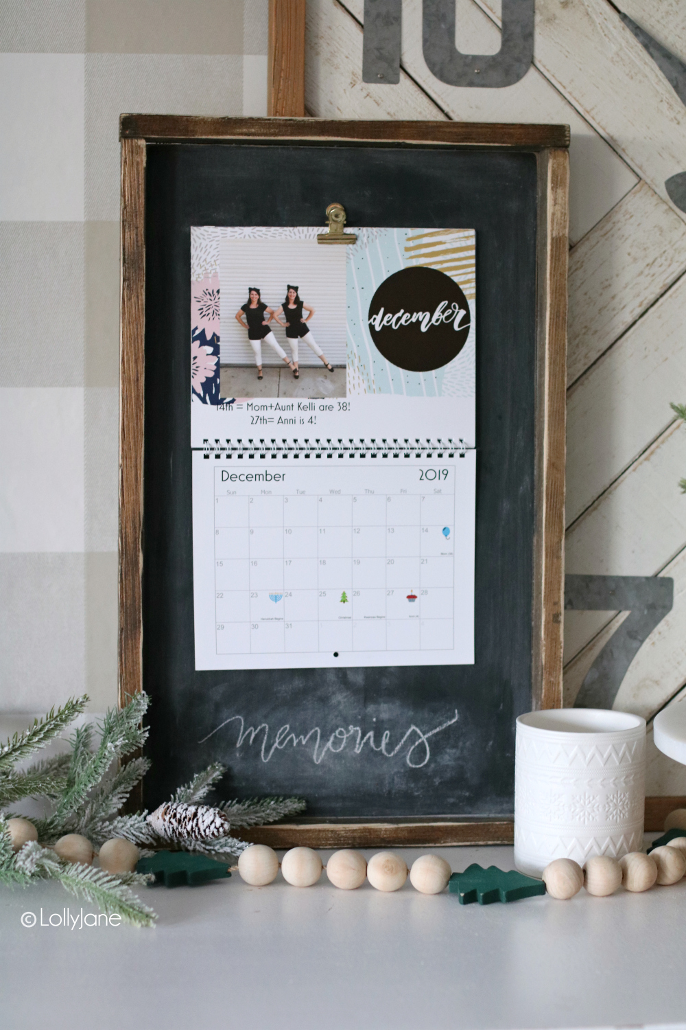 Love how simple this EASY DIY calendar holder is to switch the monthly calendar out! Make this DIY Wood Frame Calendar Holder using inexpensive wood, small nails and a gold hinge clip. #diy #calendarholder #woodcalendarholder