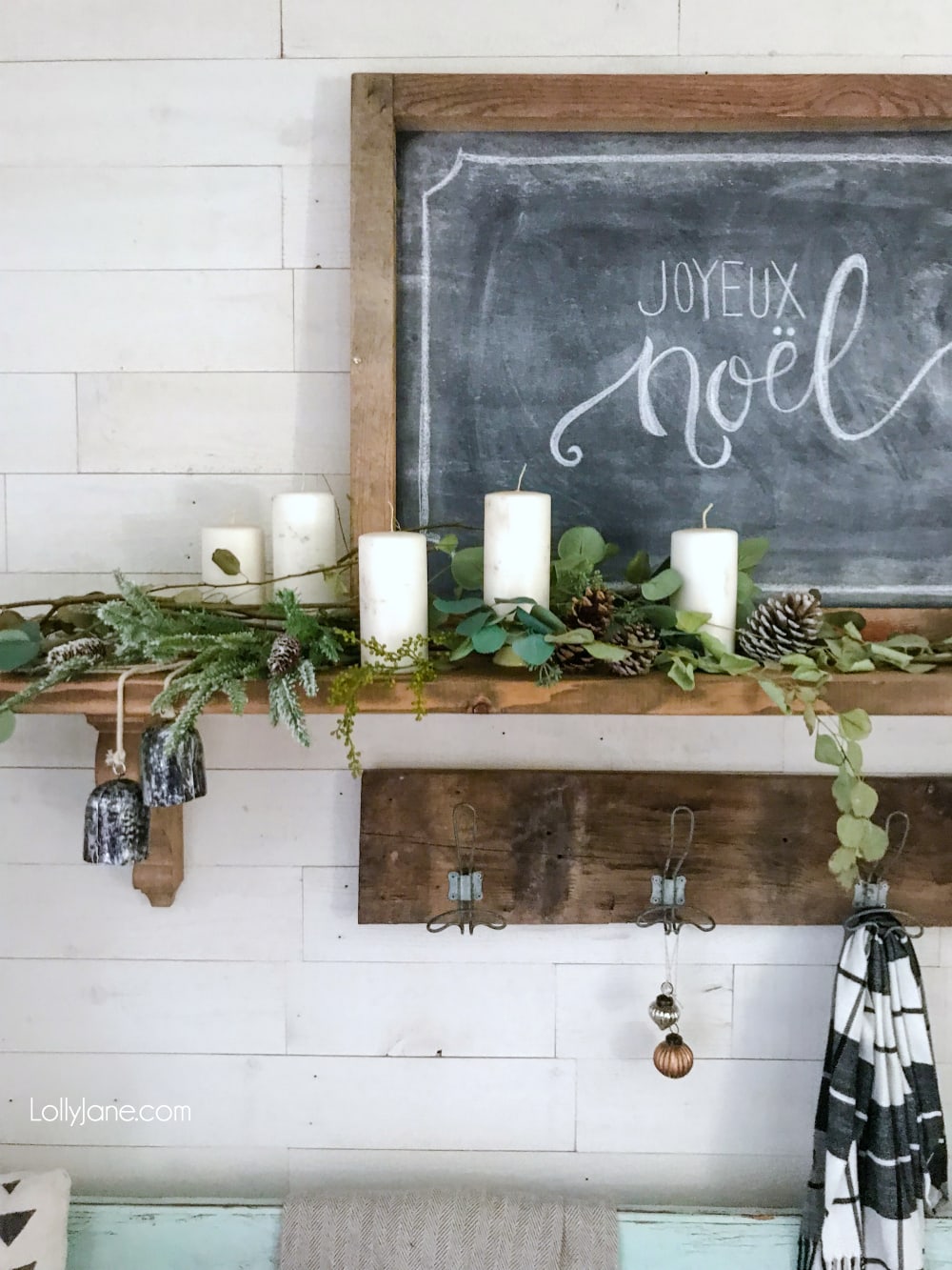 Grab some branches (greenery) from your yard, add a pinecone or two, some $1 store candles and a chalkboard with a festive phrase and BAM. Instant Christmas/winter mantel! EASY PEASY! #diy #christmasdecorations #winterdecor