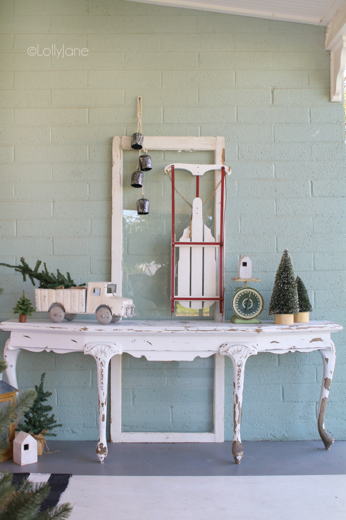 Festive and frugal Christmas porch decor. Such fun ideas for adding easy touches of Christmas to welcome your family and friends to your home. Easy porch decorating ideas for Christmas. #christmasporchdecor #christmasdecorations #christmasporchdecorations #outdoorchristmasideas