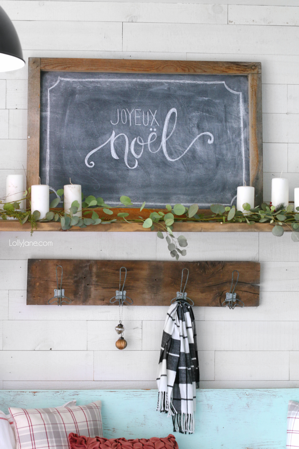 Simple wintery Christmas mantel with chalk art... feel festive without all the frills! Click through to see how this was put together! #diy #christmasdecorations #winterdecor