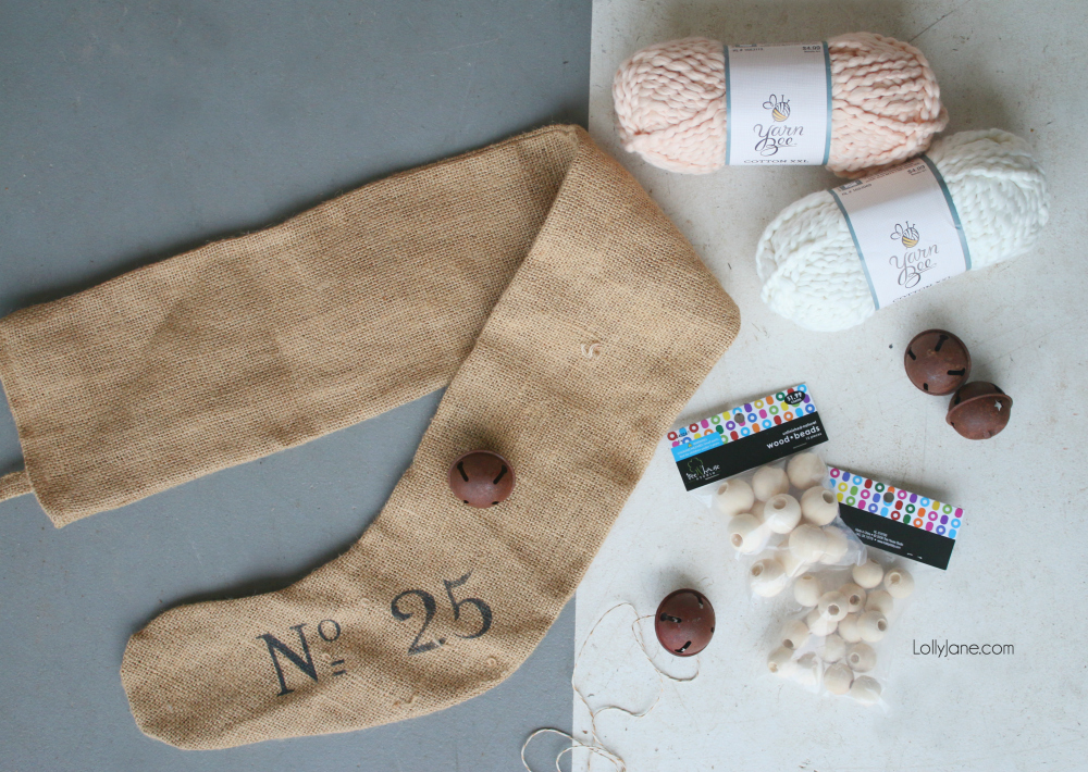 See how we transformed this rustic stocking into a ribbon with some gorgeous yarn tassels!
