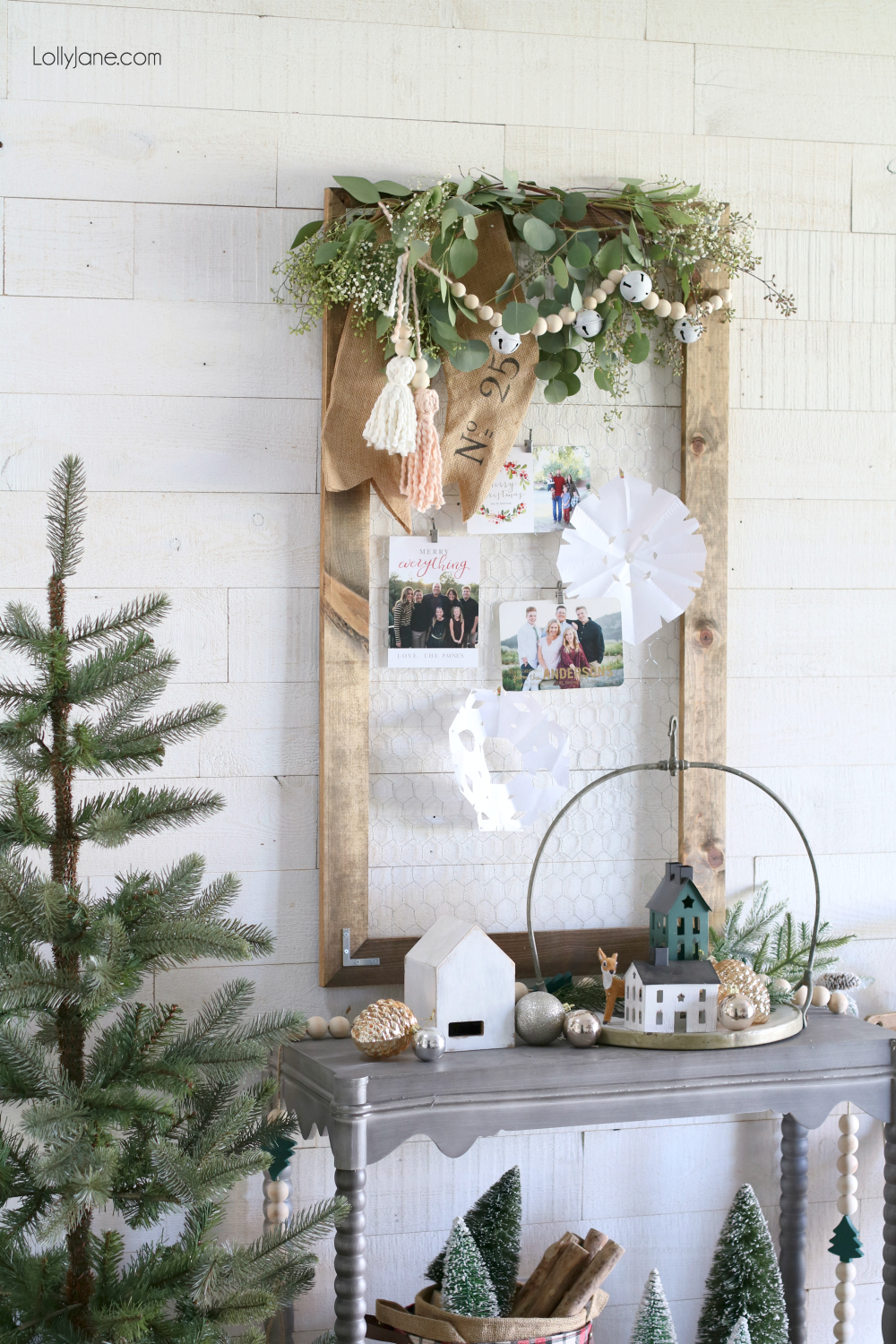 Easiest DIY Christmas Card Holder, top with leaves and this DIY garland + tassels to create the cutest display ever! #diy #garland #christmasdecor #wintervignette #diytassels