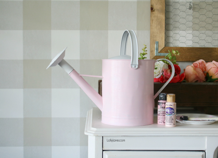 SUPER CUTE and easy peasy watering can makeover. Click to see how to add instant SPRING vibes to your decor with just a few steps and for a few dollars! #homedecor #topspringideas #freshspringideas #springhomedecor