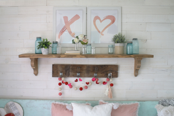 Valentines Day Decor | What a fun Valentine's Day entryway decor! Download these printables, frame them then place above a mantel or shelf for easy and affordable Valentines Day decor! #vintagevalentinesday #valentinesdaydecor #vdaydecor #vdaymantel #valentinesdaymantel #bluemasonjarcollection #pinkvaletinesdaydecor