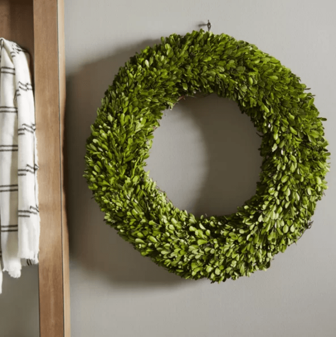 This preserved boxwood wreath is a staple in any farmhouse! #farmhouseideas #farmhousedecor #farmhousewreath #farmhous