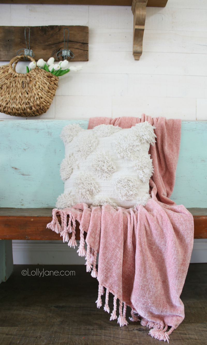Love this spring linen home decor with a cozy chenille throw and chunky loop pillows. Helps create the perfect spring entryway to welcome warm weather. Love this easy to copy spring mantel decor. #springdecor #springmantel #manteldecor #springentryway #homedecor