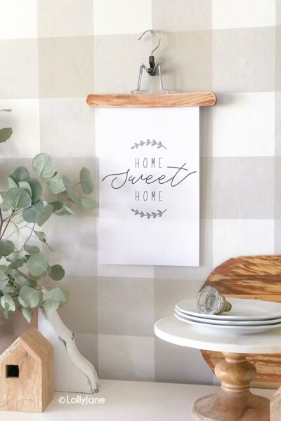 Jump on the farmhouse trend without spending an arm and a leg! Simply print this pretty "Home Sweet Home" printable art to add just enough farmhouse charm! #farmhouse #printable #freeprintable #printableart #farmhouseart #farmhouseprintable