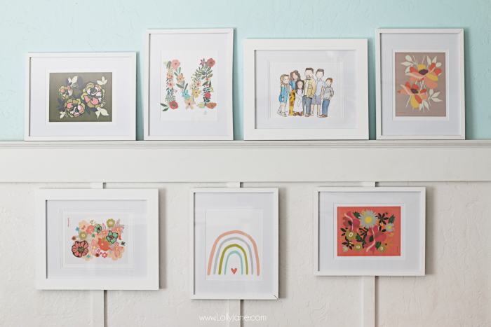 Framed gallery wall ideas, love this fun family room wall decor! #whiteframes #gallerywall #framedgallerywall #familyroom