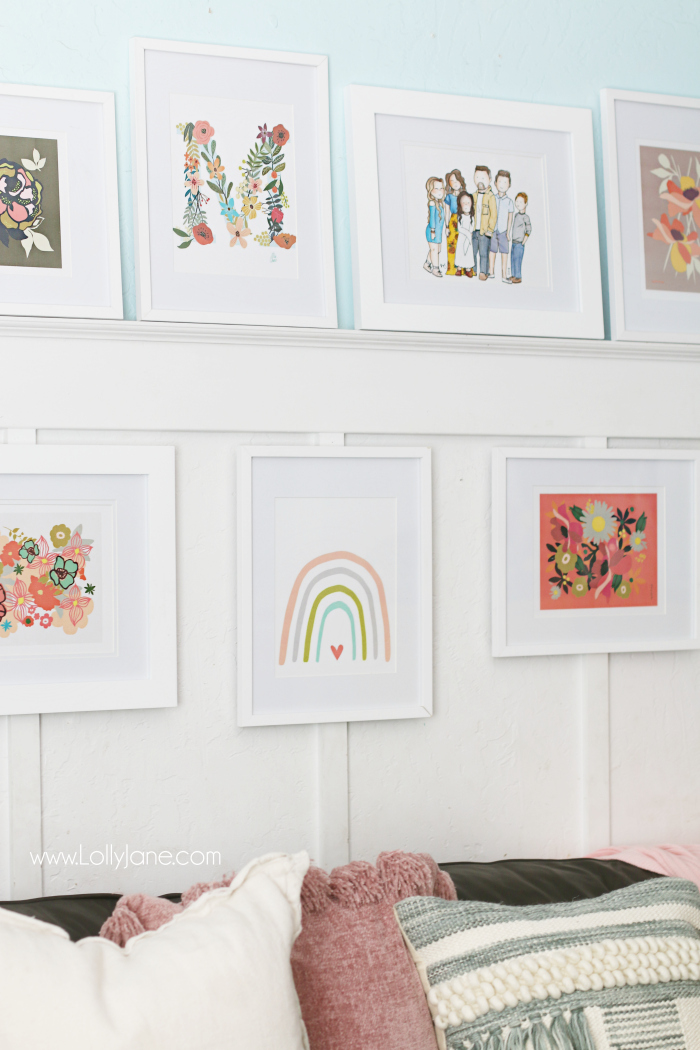 Loving these white gallery wall frames with white mats to create a uniform gallery wall and colorful prints. Floral prints with a watercolor rainbow print make for a fun boho gallery wall. #bohodecor #gallerywall #galleryframes #whiteframes #walldecor