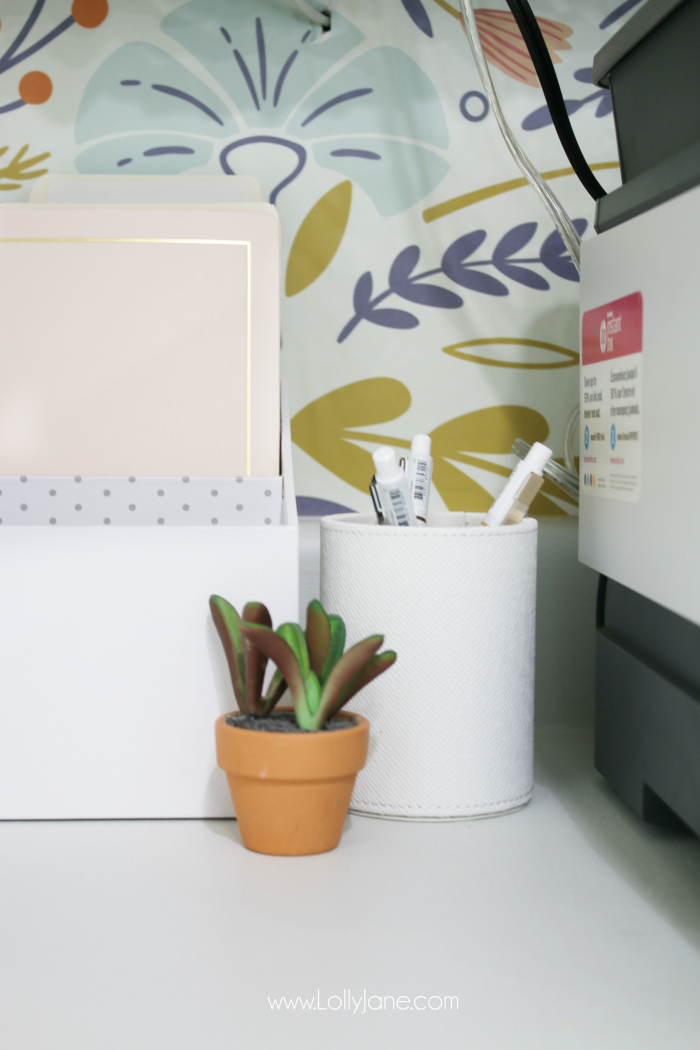 How to create a girlboss office space using a fun removable wallpaper and white office accessories, so cute! #officedecor #officespace #smalloffice #girlboss #girlbossoffice #smallbusiness