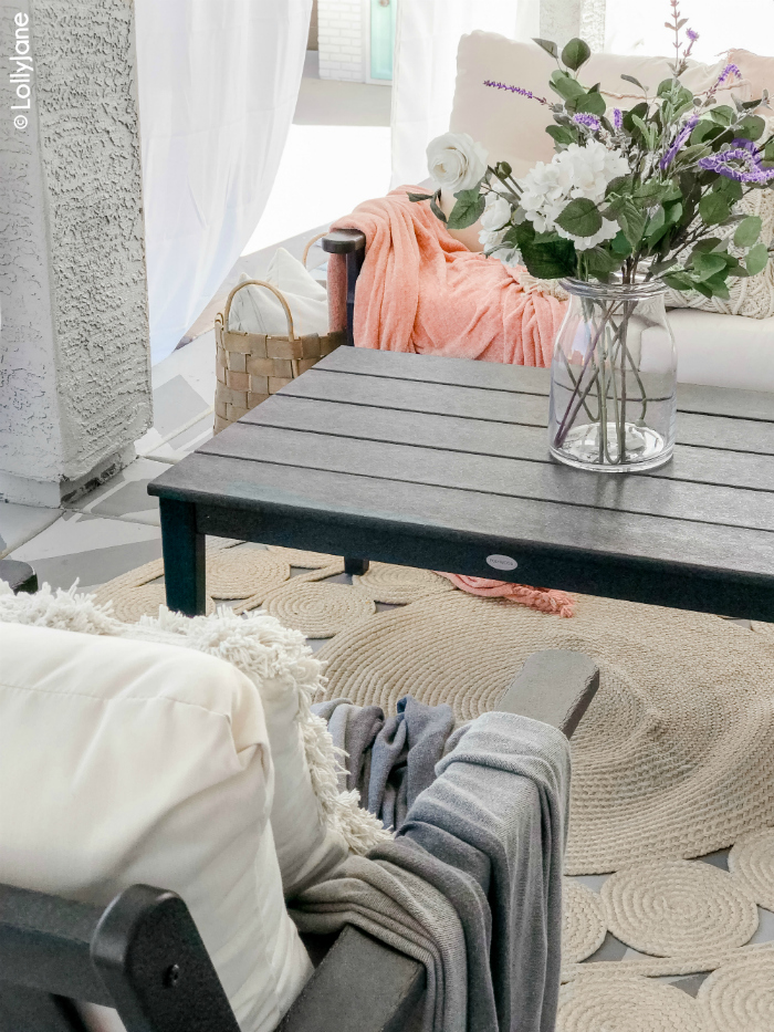 Are you looking for small patio decorating ideas? Check out our modern farmhouse porch, full of cozy accents and durable furniture. #polywood #farmhouseporch #porchdecor #farmhousedecorations #modernfarmhouse #cozyporch