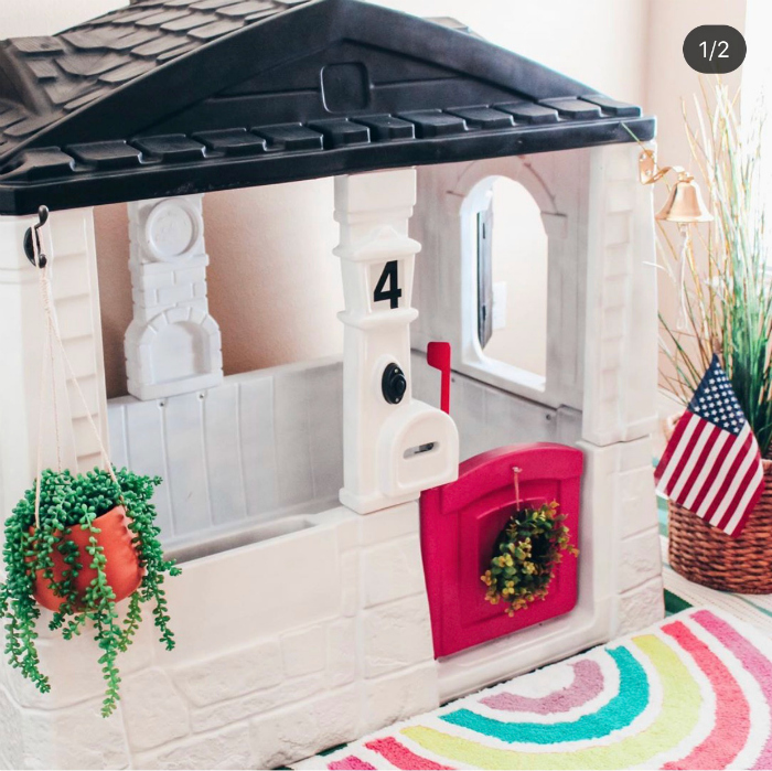 check out this colorful rainbow themed playhouse!! #rainbowplayhouse #diyplayhouseideas #remodelplayhouseideas #playhousemakeover #girlyplayhouseideas