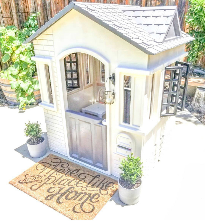 Check out this white and grey playhouse!! #whiteplayhouseremodel #remodelplayhouse #woodenplayhousemakeover #cuteplayhousemakeover #diyplayhouse