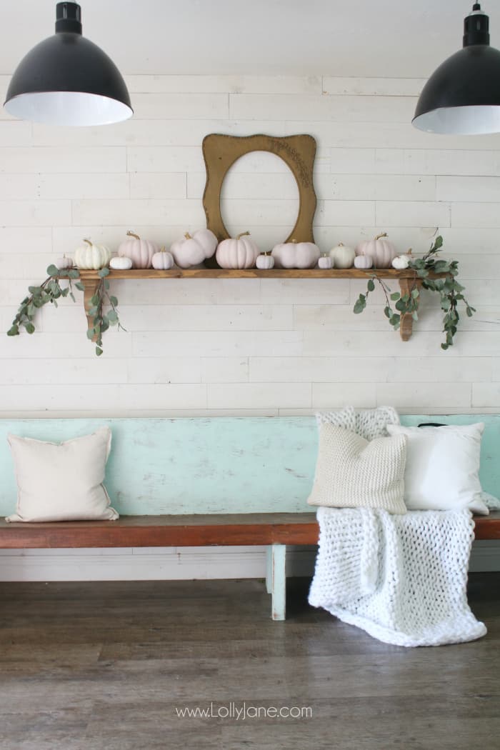 Dying over this simply fall mantel decor! Love the blush pink painted pumpkins with pretty natural leaves. #falldecor #blushpinkpumpkins #pumpkindecor #pinkpumpkins #fallmanteldecor #fall2019