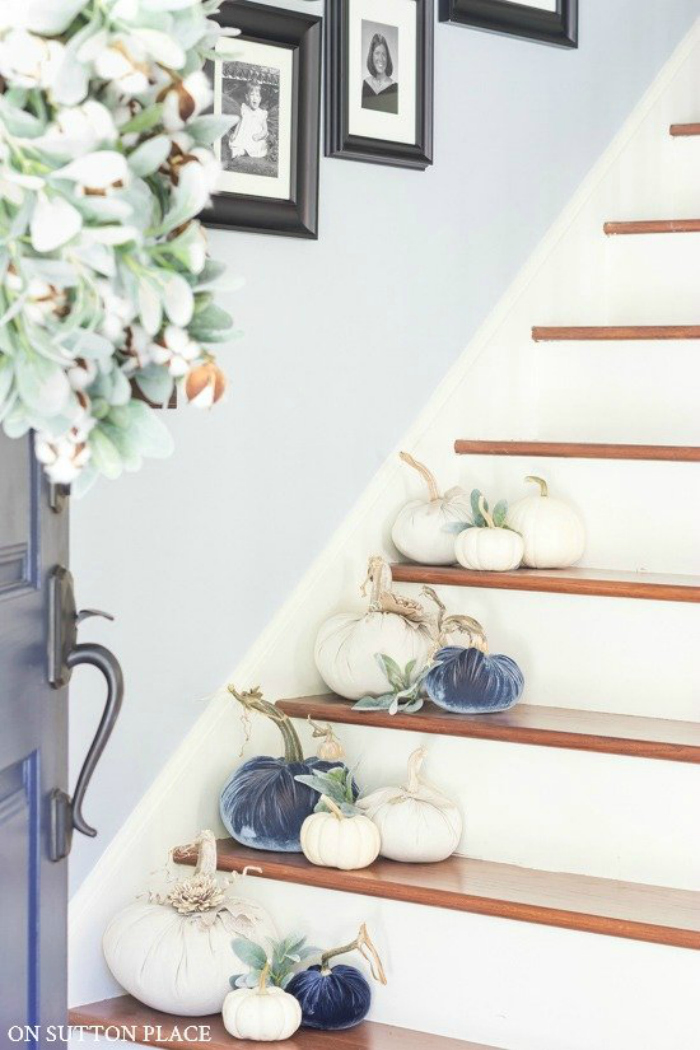 Easy fall decorating ideas placing pumpkins on the stairway. Love these mixed velvet and white pumpkins for pretty fall decor. #velvetpumpkins #bluewhitepumpkindecor #decoratingstairsforfall #falldecorating #falldecorations #pumpkinstairs