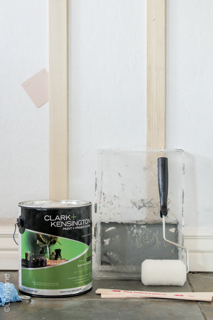 EASIEST ever board and batten tutorial-- and wait until you see what color is was painted. WOW! #diy #boardandbatten #walltreatment #pinkwall