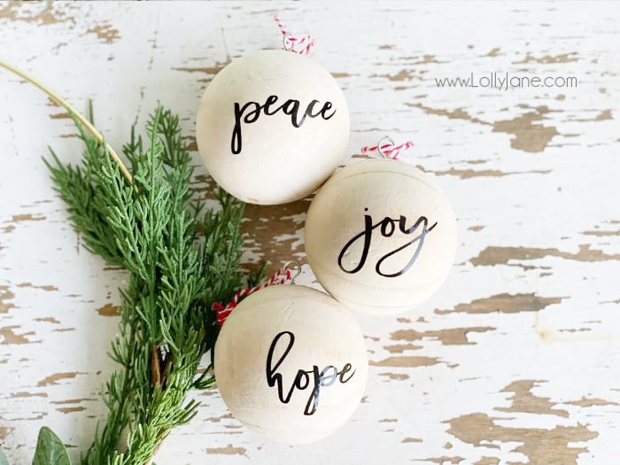 Make your own gorgeous script wood ball ornament set for your Christmas tree. This simple DIY is the perfect craft to get you in the Christmas spirit. #hadmadeChristmas #diyornament #diychristmas #christmasornament #christmasdecor