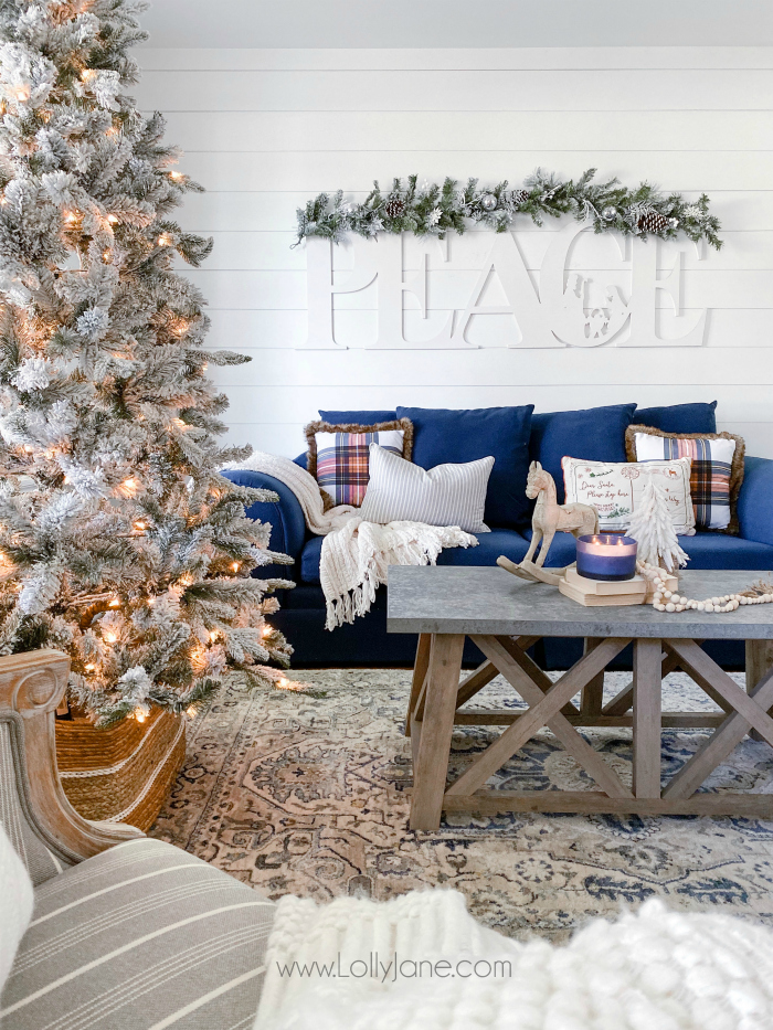 Loving this modern farmhouse hygge vibe going on in this room reveal! Create this cozy farmhouse family room Christmas with a few staple items! #hyggechristmas #modernfarmhouse #chrismtasdecor #farmhousechristmas #christmasdecorations #christmasfarmhouse #cozychristmas