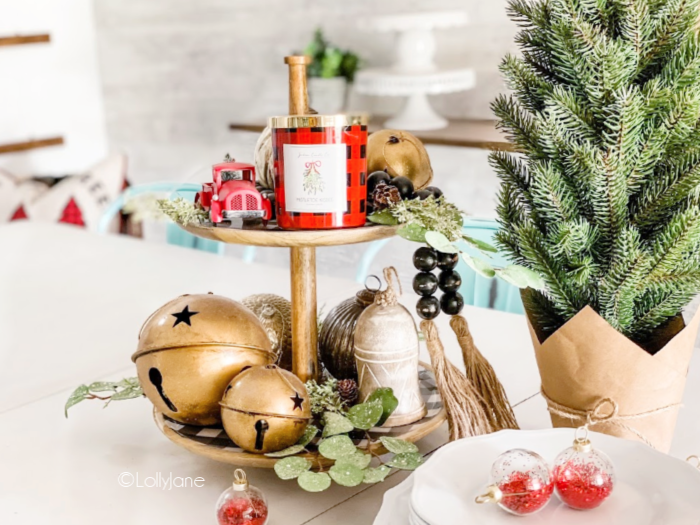 Looking for simple holiday party decor? This easy Christmas tiered tray is a breeze to put together and looks stunning! #easytieredtray #christmastieredtray #howtomakechristmastieredtray #buffalochecktieredtray #farmhousetieredtray