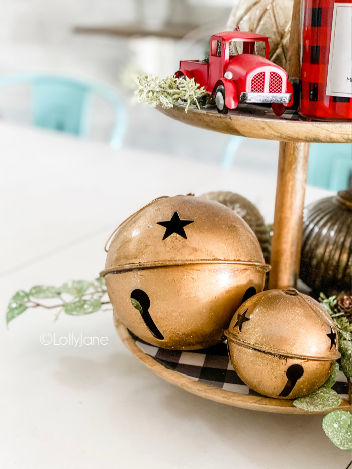 How to transition Christmas to winter decor with a tiered tray. Use neutral and gold farmhouse decor for Christmas then swap the red accents for white! So easy to recreate this pretty holiday tiered tray centerpiece. #tieredtray #holidaytieredtray #christmastieredtray #easychristmasdecor