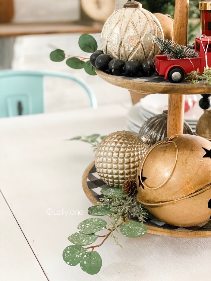 Loving these neutral tiered tray decor ideas to decorate from Christmas until after the New Year! Consider transitional decor when decorating for the holidays! #neturalholidaydecor #farmhousechristmas #modernchristmasdecor #tieredtraydecor #easytieredtraydecor