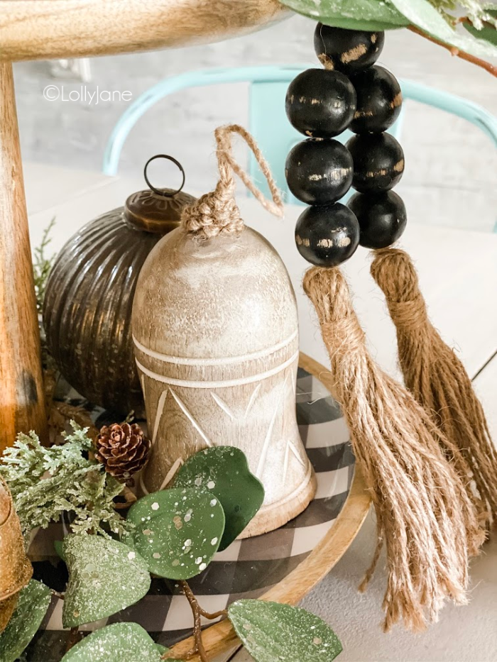 Easy New Years party decor ideas using black and white accents with neutral pieces. #newyearspartyideas #newyearstieredtray #wintertraydecor #wintertieredtrayideas