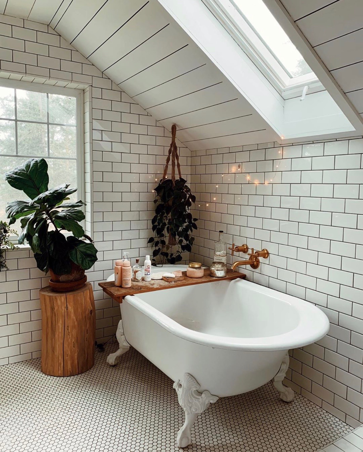 Dreamy Vintage Bungalow Style Bathroom... that subway tile/skylight combo is DREAMY! #vintage #farmhousebathroom #bathroomreno #fixerupper