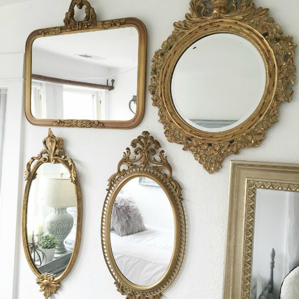 Hallstrom Home created this darling bedroom mirror gallery wall for her daughter's space. So pretty! #goldgallerywall #goldmirrorgallerywall #bedroomgallerywall #bedroommirrorgallerywalldecor #gallerywalldecor