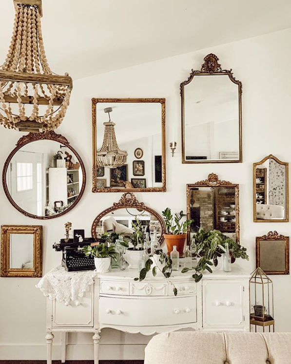 Adore this white buffet under this mirror gallery wall entryway decor for stunning decor. Such a pretty farmhouse entryway, wow. #entrywaydecor #entrywaymirrorgallerywall #entrywaygalleryideas #mirrorgallerywalldecor