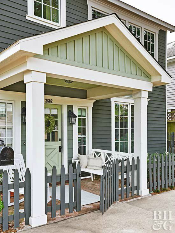 Holy! Adore this gorgeous dark gray and green two tone painted house. I recently added board and batten gables to our own home so I'm partial to this green board and batten. It's so pretty, bold yet classic. #boardandbattenexterior #greenexteriorhome #grayexteriorhome #darkpaintexterior