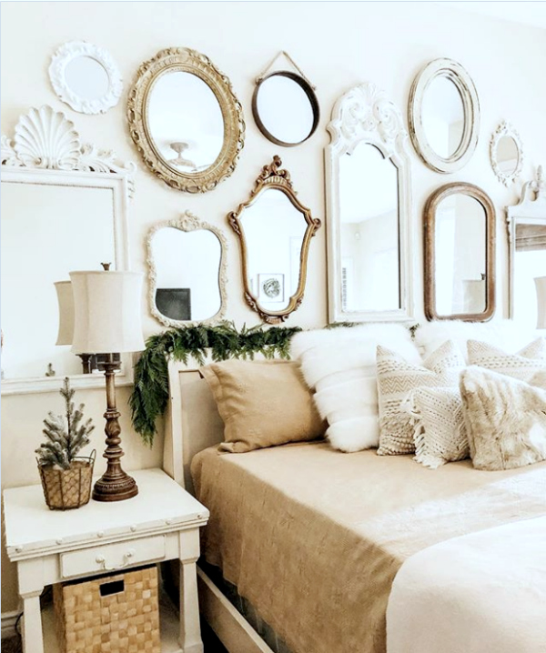 Wondering what to put above your bed? Add mirrors above your bed for a pretty mirror gallery wall decor idea! #masterbedroomdecor #masterbedroomgallerywall #mirrorgallerywall #bedroommirrorgallerywall