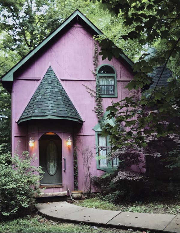 What a bold statement with this dark painted exterior house: a purple painted house! Such a fun house color if you're looking to go colorful! #purplepaintedhouse #purpleexterior #darkexterior #darkhousecolors