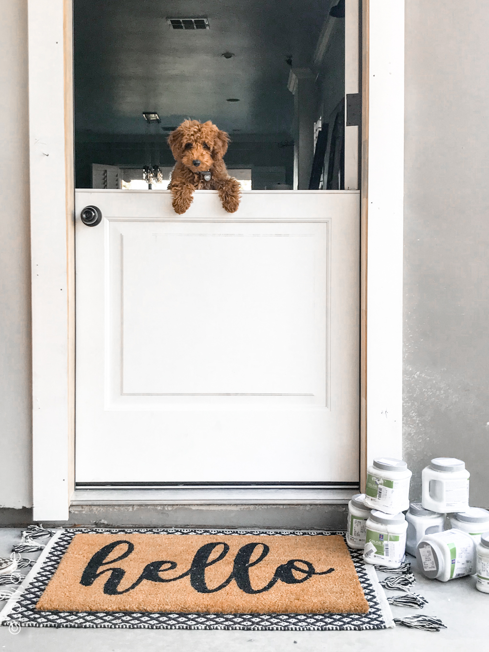 HOLY cow! Go see the amazing AFTER of this newly installed Dutch door and simple porch makeover! #diy #stencil #Dutchdoor #pinkdoor #makeover #porchdecor #porchmakeover