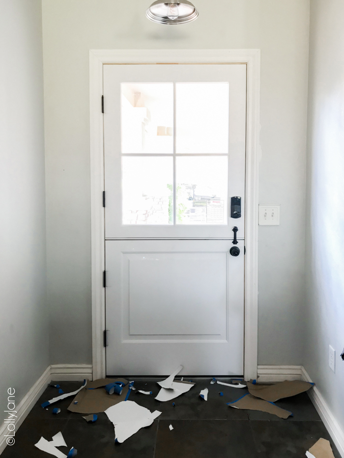 HOLY cow! Go see the amazing AFTER of this newly installed Dutch door and simple porch makeover! #diy #stencil #Dutchdoor #pinkdoor #makeover #porchdecor #porchmakeover