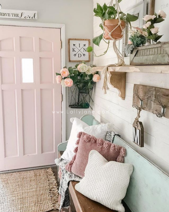 Such fun pink double doors in this shiplap entryway. Check out the newly added double dutch doors, a great way to add natural light to your home. #dutchdoor #frontdutchdoor #exteriordutchdoor #doubledutchdoors #frenchdutchdoors #farmhousedutchdoors