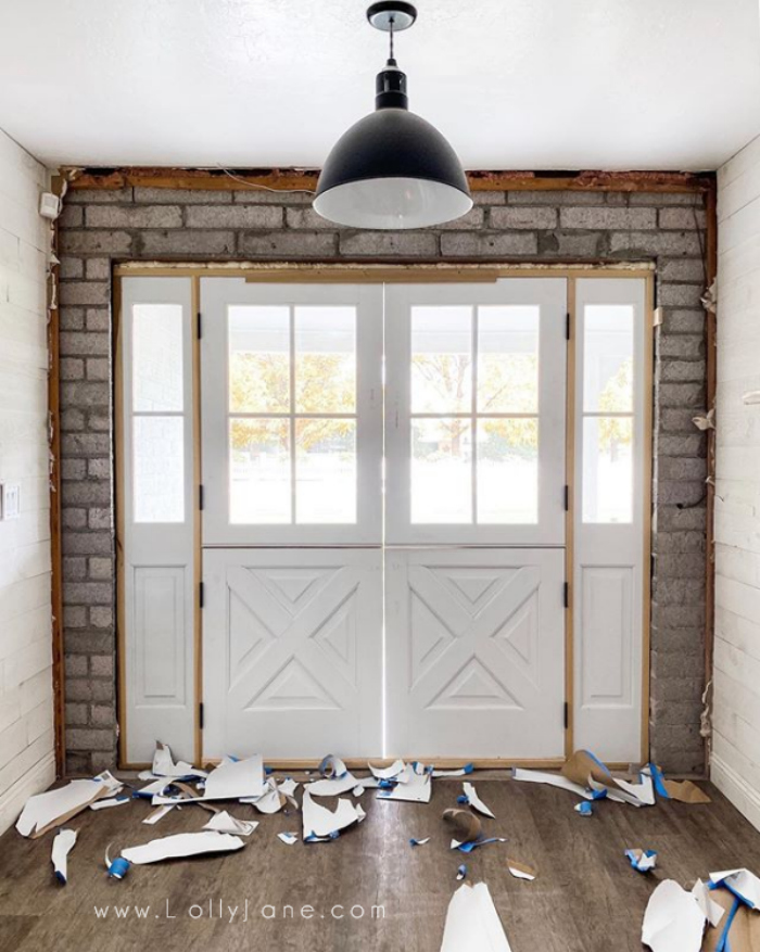 Looking for statement front doors? We recently installed double dutch doors and couldn't be happier! We love the added farmhouse style window sidelights. Click through for all your dutch front door questions to be answered. #dutchdoor #frontdutchdoor #exteriordutchdoor #doubledutchdoors #frenchdutchdoors #farmhousedutchdoors