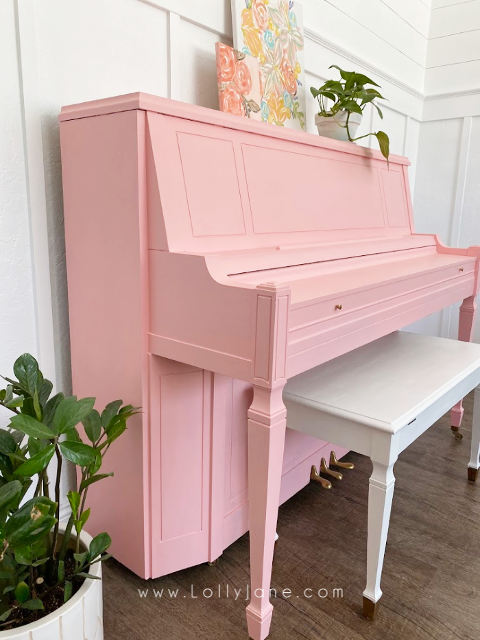 You only need a little paint and a couple hours to transform a dull piano into a happy work of art! This tutorial shows you how easy it is to paint a piano. #howtopaintpiano #paintedpiano #pinkpiano #pinkpaintedpiano #paintedpianotutorial